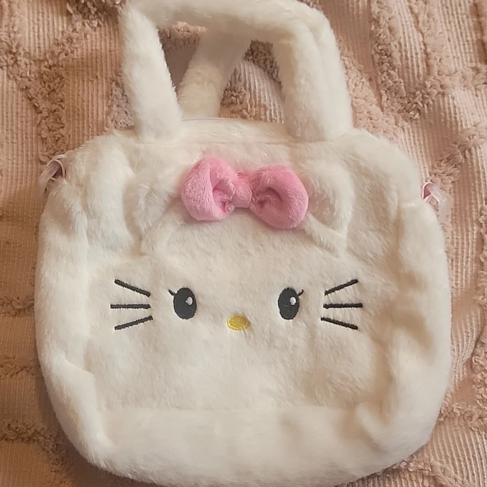 Hello Kitty Handbag with adjustable shoulder strap. White with pink bow. NWOT
